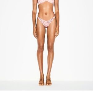 SKIMS Rose Pastel snake print thong